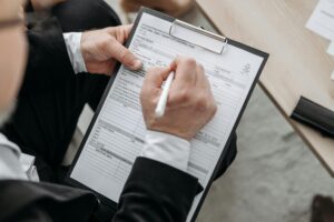 Man filling out a form